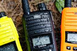 Collection of The GME TX6165 series of handheld UHF CB radios in a gallery layout