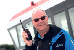 Collection of Alan Holding a marine VHF radio in a gallery layout