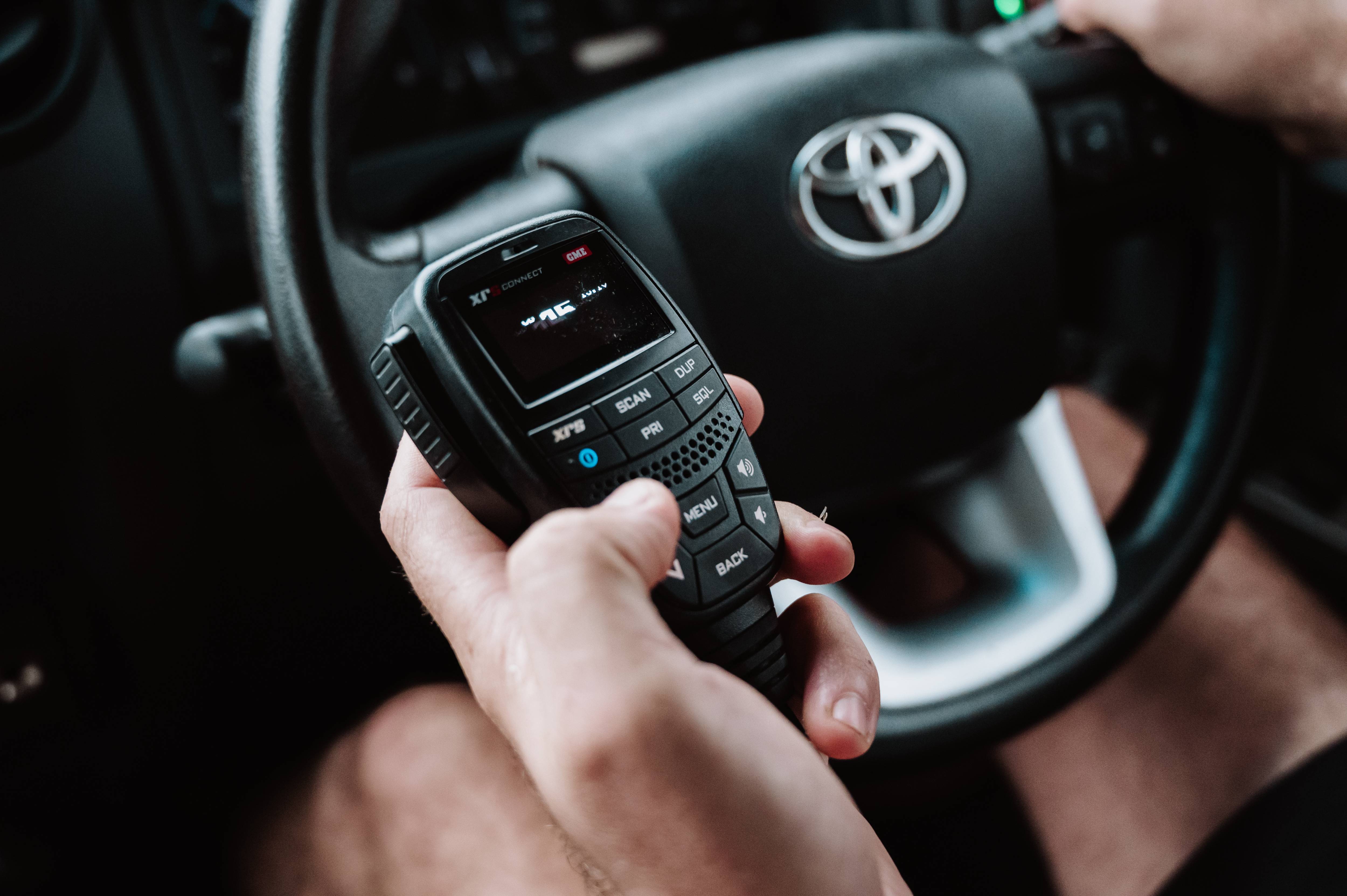 GME 4WD Touring XRS handset in use