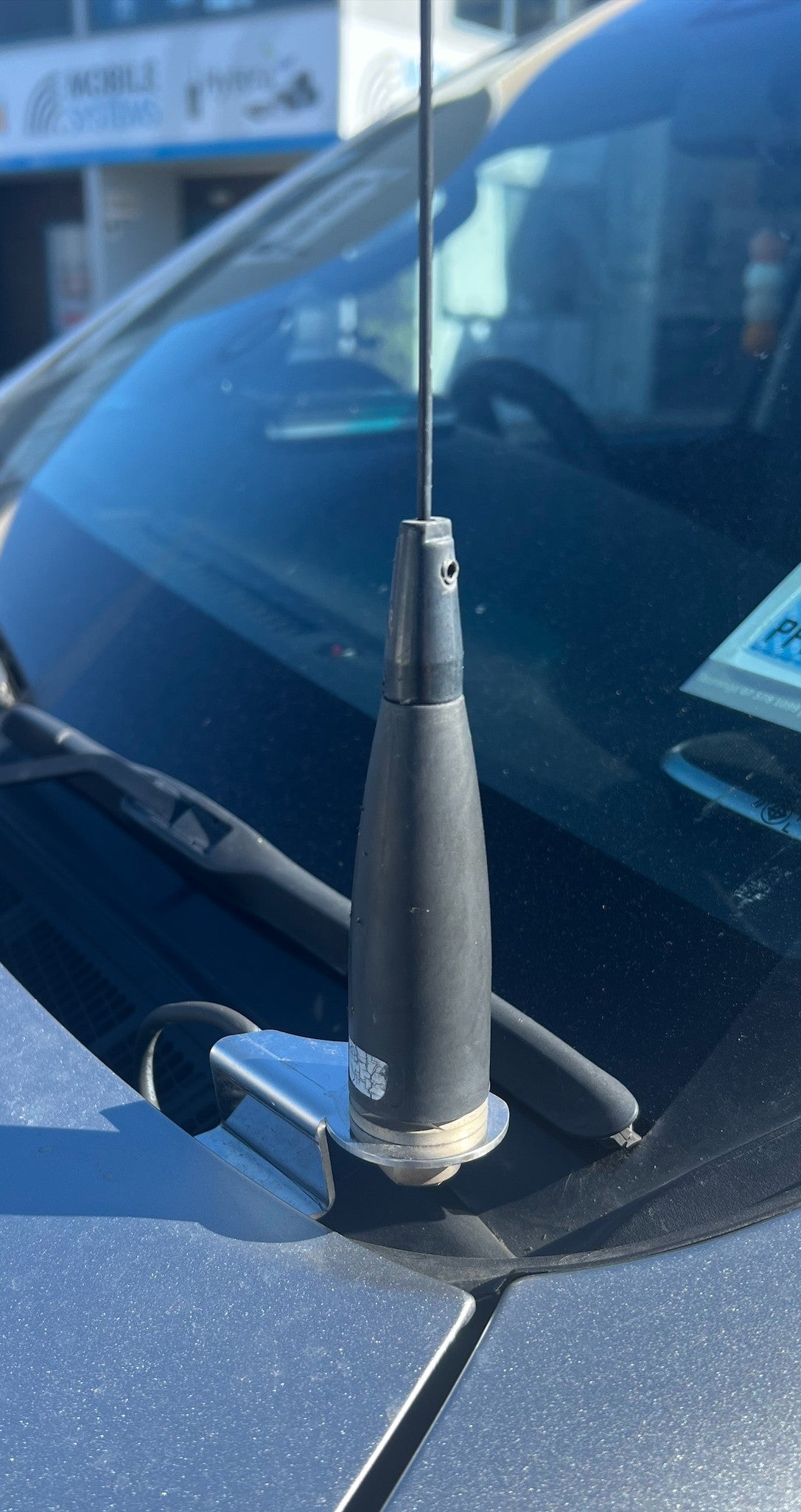 Collection of MSL bonnet hinge antenna mount fitted to the bonnet hinge of a Toyota Hilux in a gallery layout